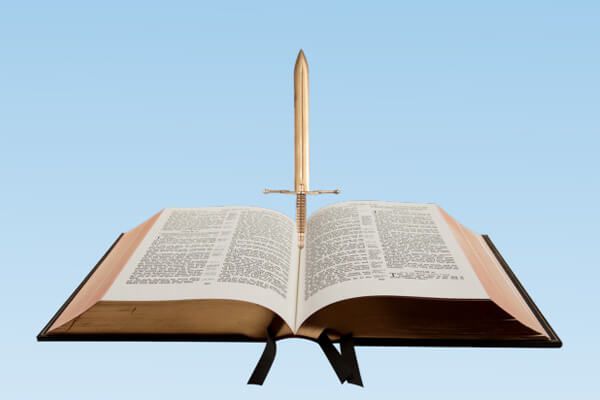 Open Bible with sword